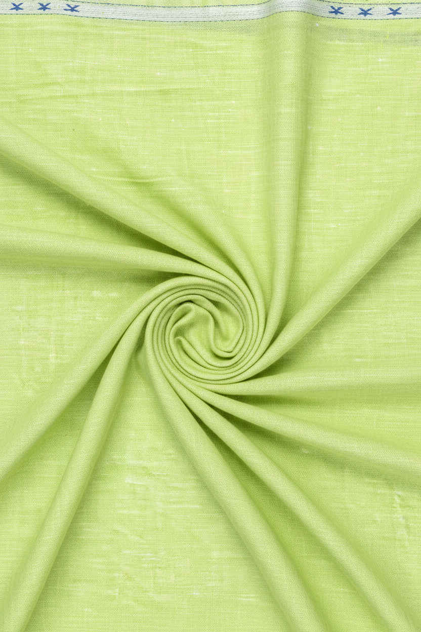 Light beige Arvind linen shirting fabric with a smooth texture, suitable for stylish shirts and summer wear.