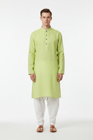 Arvind linen shirting fabric in light blue with subtle texture, ideal for custom shirts and summer clothing.