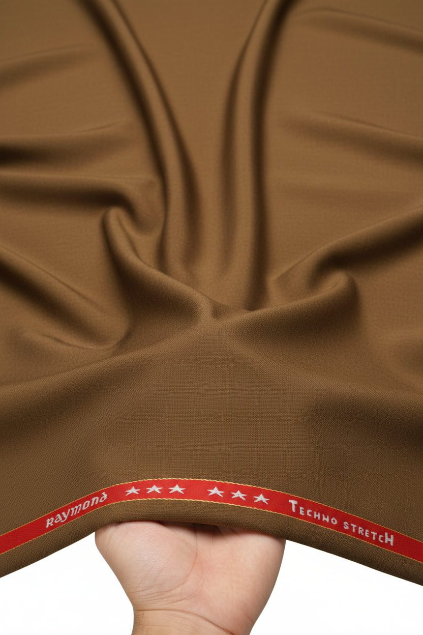 Raymond Luxurious Unstitched Polywool Trousers and Suiting Fabric in bronze, showing textured fabric with woven pattern.
