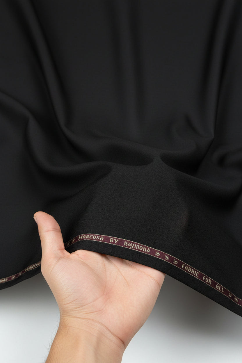Green fabric with a visible brand label at the top