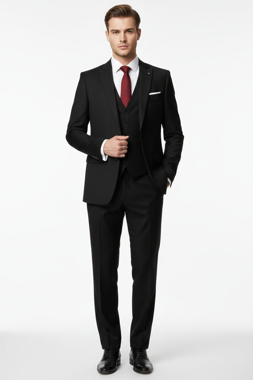 Raymond Polywool trousers and suiting fabric in English Green, showing the textured fabric with a tailored fit.