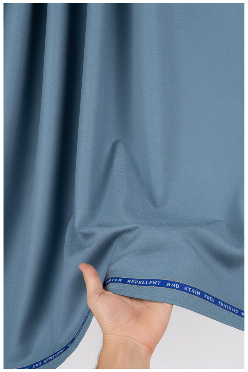 Raymond luxurious unstitched polywool trousers and suiting fabric in denim blue, ideal for custom tailoring and formal wear.