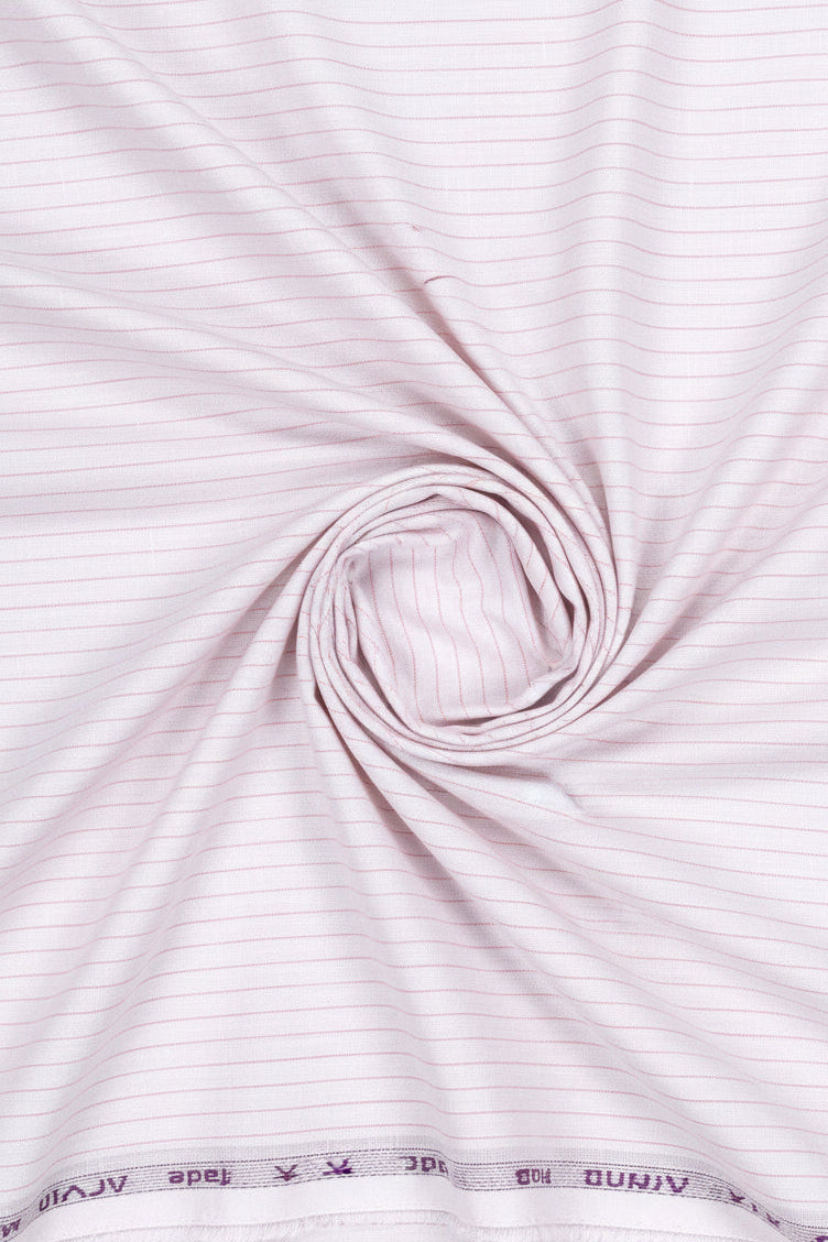 Close-up of white fabric with pink stripes and Arvind branding.