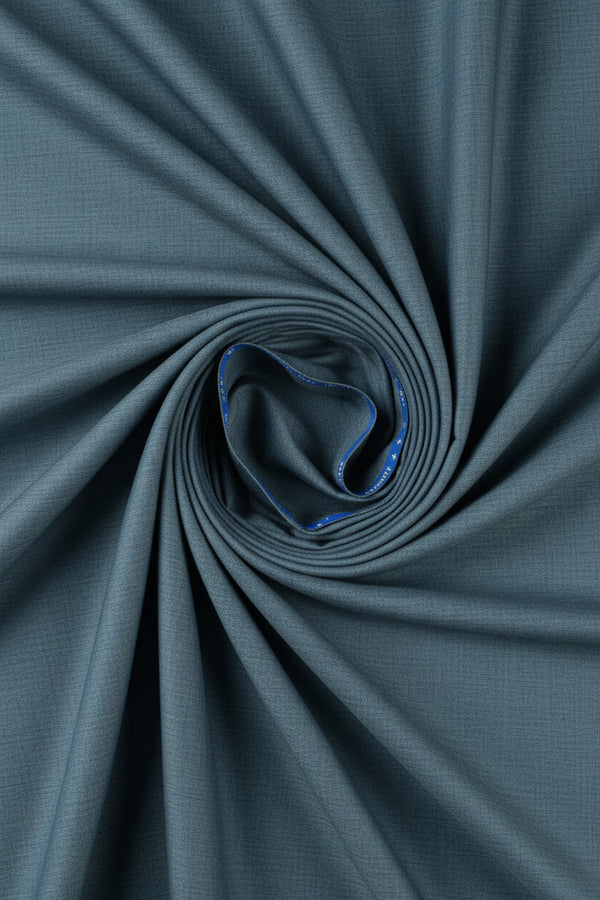 Grey Raymond Super 120’s poly-wool suiting fabric, close-up of textured woven material with fine pattern details.