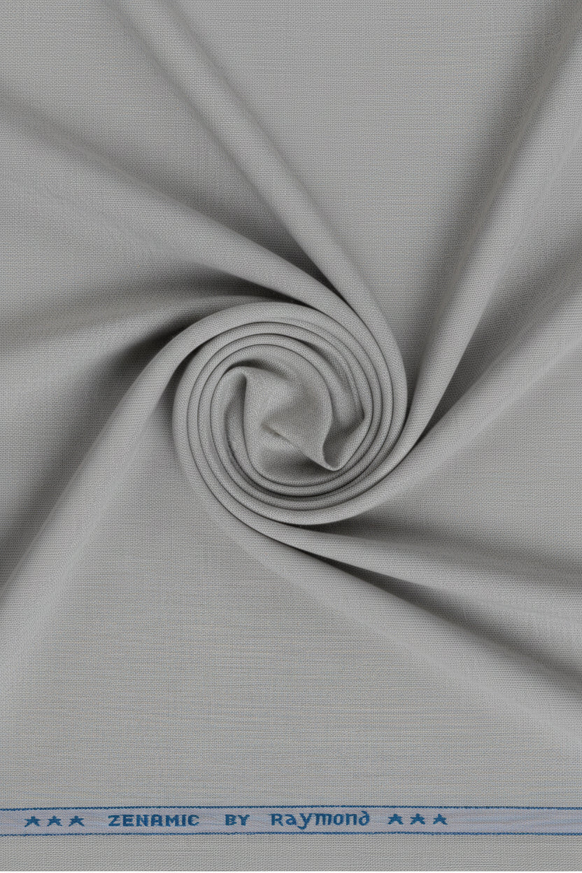 Gray cloud polyviscose trousers and suiting fabric from Raymond, showcasing unstitched fabric for tailoring or custom suit making.