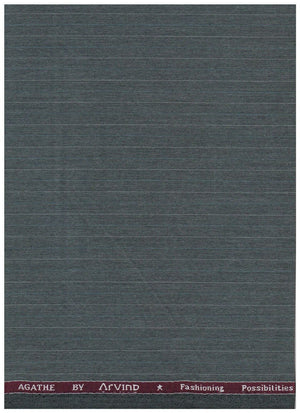 A rectangular woven fabric sample with a dark slate gray body and a maroon top border featuring white text that reads 'AGATHE BY AIRVIND' and 'Fashioning Possibilities'.