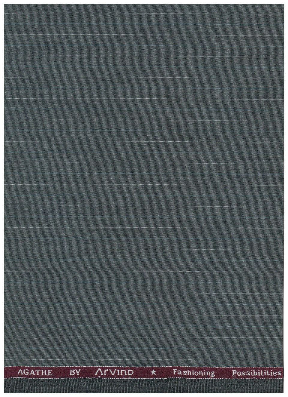 A rectangular woven fabric sample with a dark slate gray body and a maroon top border featuring white text that reads 'AGATHE BY AIRVIND' and 'Fashioning Possibilities'.