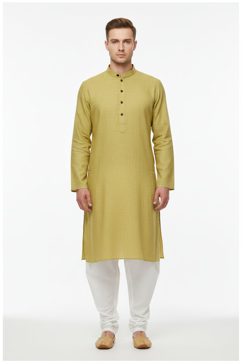 Arvind plain linen shirt fabric in hazelnut yellow, showing soft texture and fabric detail for garment making or sewing projects.