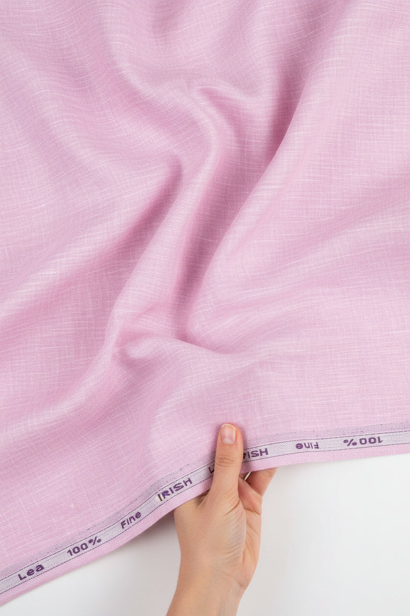 Pink Arvind Irish linen shirt fabric with a soft, textured linen pattern, ideal for stylish, breathable shirts.