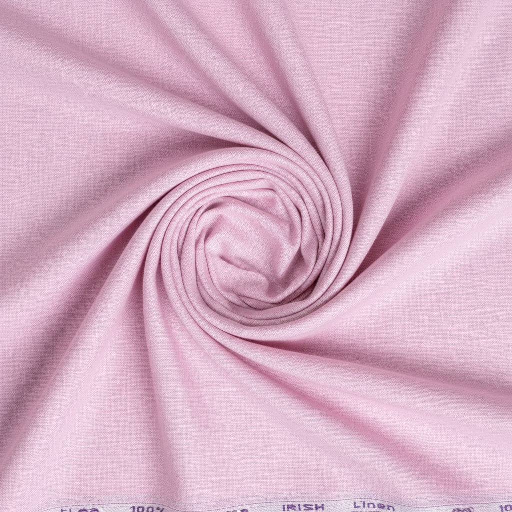 Pink Irish linen fabric by ARVIND featuring a soft, textured linen surface suitable for shirt making.