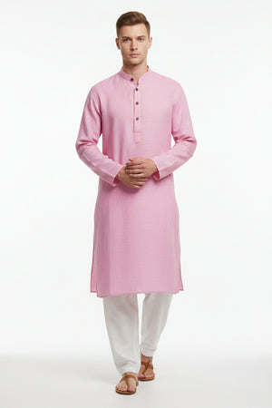 Pink Arvind Irish linen shirt fabric with a soft, textured appearance, ideal for lightweight, breathable clothing.