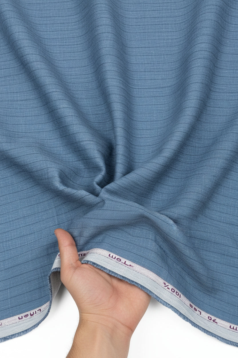 Blue Arvind 70-Lea linen shirting fabric with subtle stripe pattern, ideal for stylish shirts and lightweight apparel.