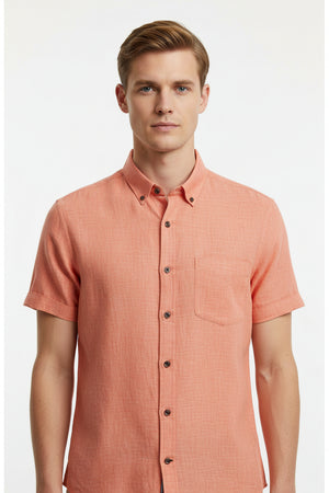 Unstitched Arvind Pure Linen Shirt Fabric in Carrot Orange, showcasing soft, breathable linen material for custom clothing.