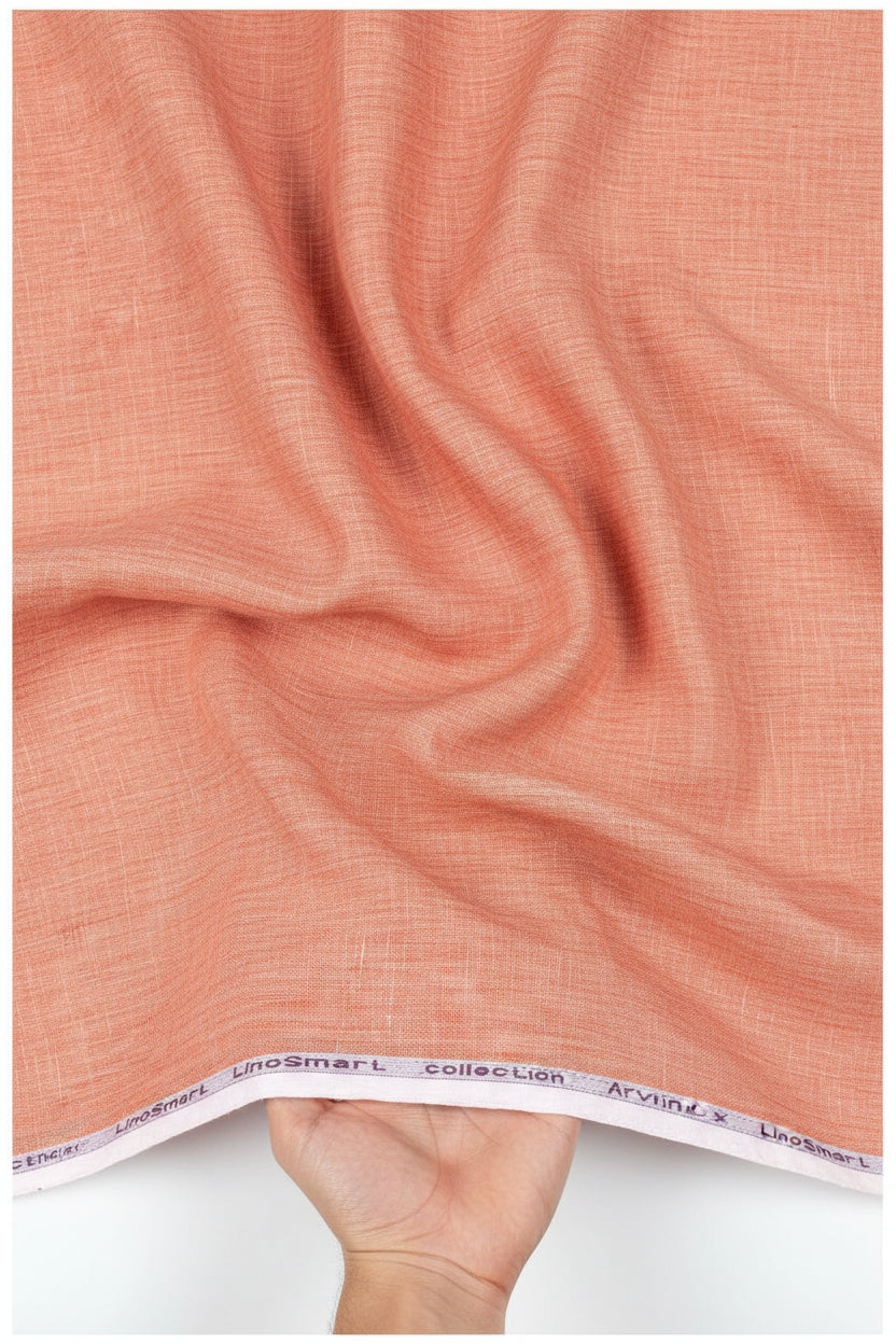 Arvind pure linen fabric in carrot orange, unstitched shirt material with a smooth, lightweight texture for tailored clothing.