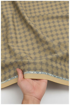 Yellow camouflage Tresca cotton shirting fabric by Arvind, featuring a soft, unstitched textile design with detailed camouflage pattern.