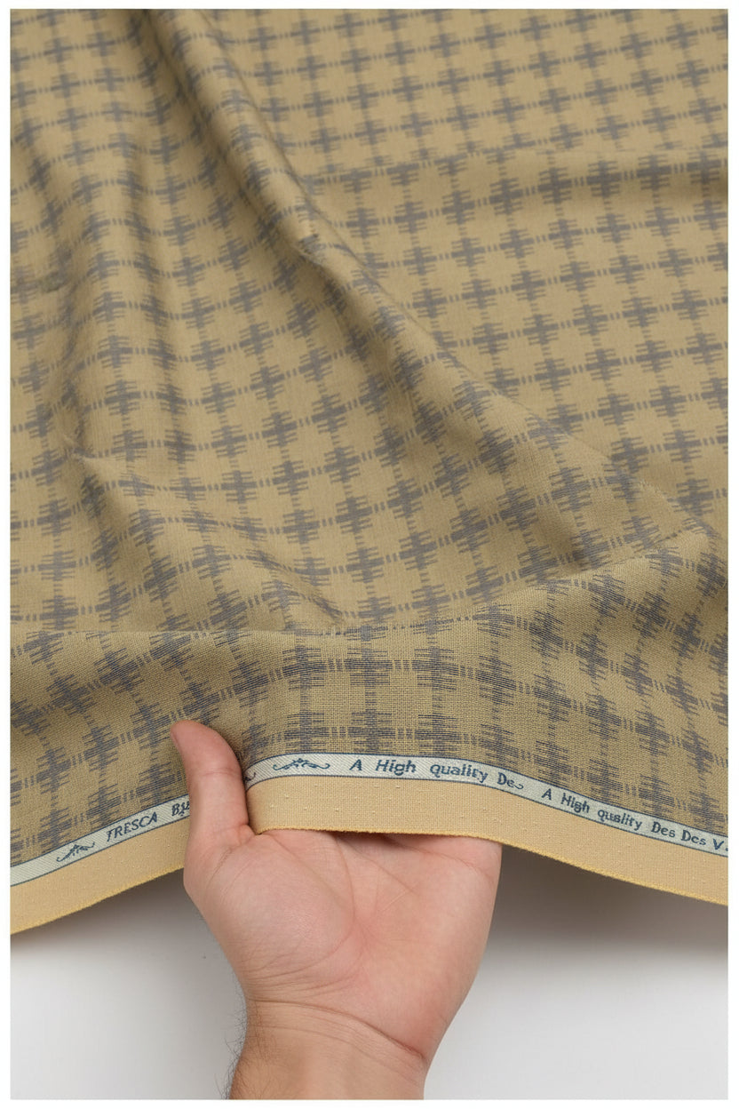 Yellow camouflage Tresca cotton shirting fabric by Arvind, featuring a soft, unstitched textile design with detailed camouflage pattern.