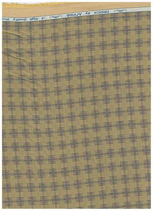 Yellow camouflage Tresca cotton shirting fabric by Arvind, showcasing the fabric's texture and pattern detail.