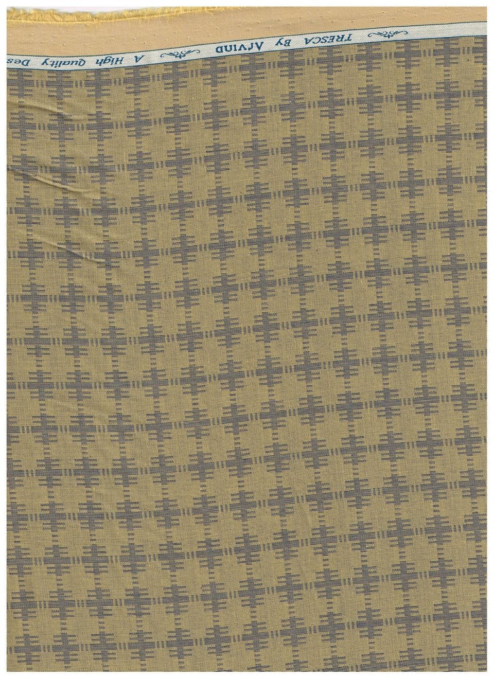 Yellow camouflage Tresca cotton shirting fabric by Arvind, showcasing the fabric's texture and pattern detail.