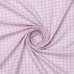 Blue check linen shirt fabric from Arvind Tresca, featuring pink background and lightweight, breathable linen texture.