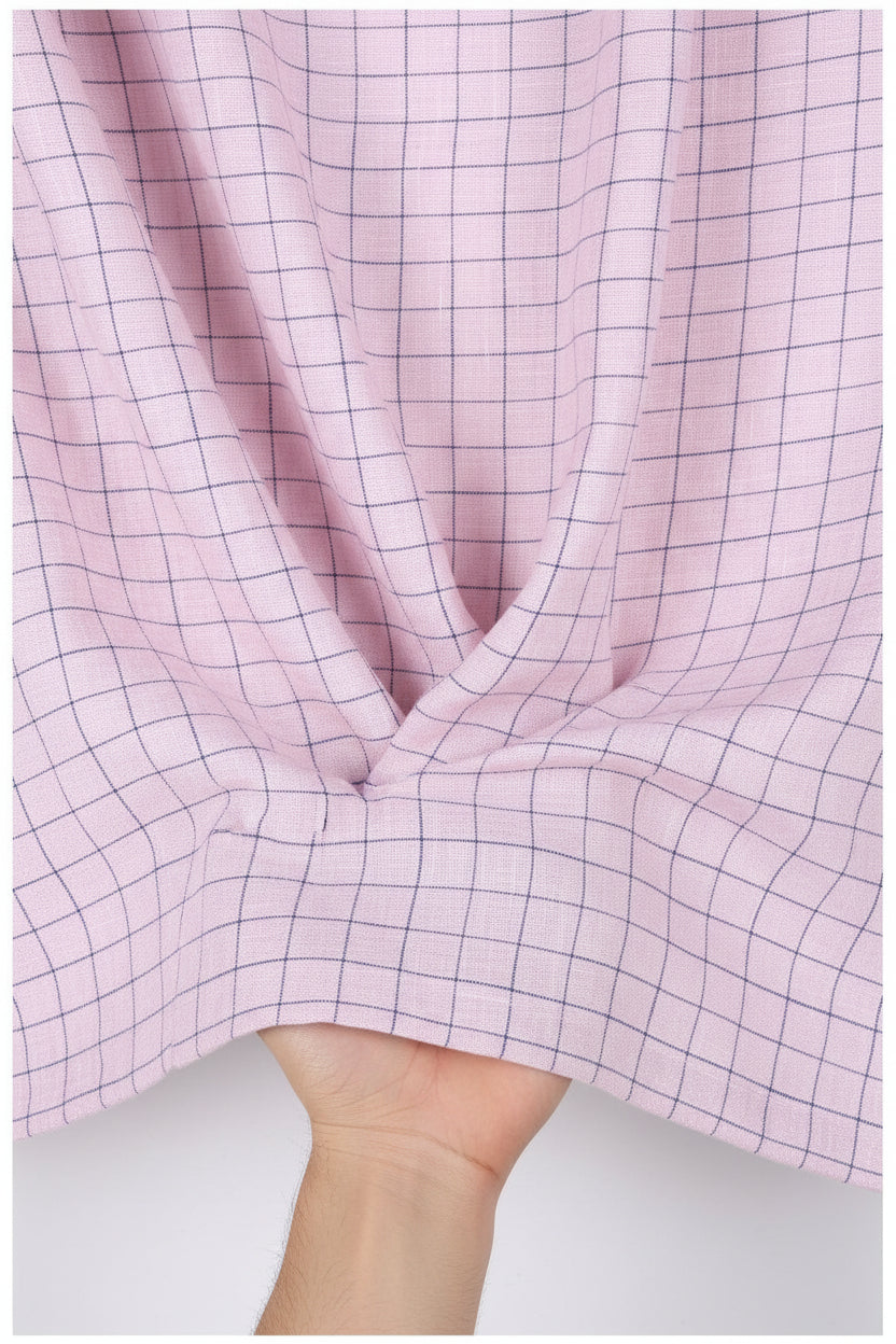 Blue check linen fabric by ARVIND, Tresca style, displayed on pink background with fabric texture and pattern visible.