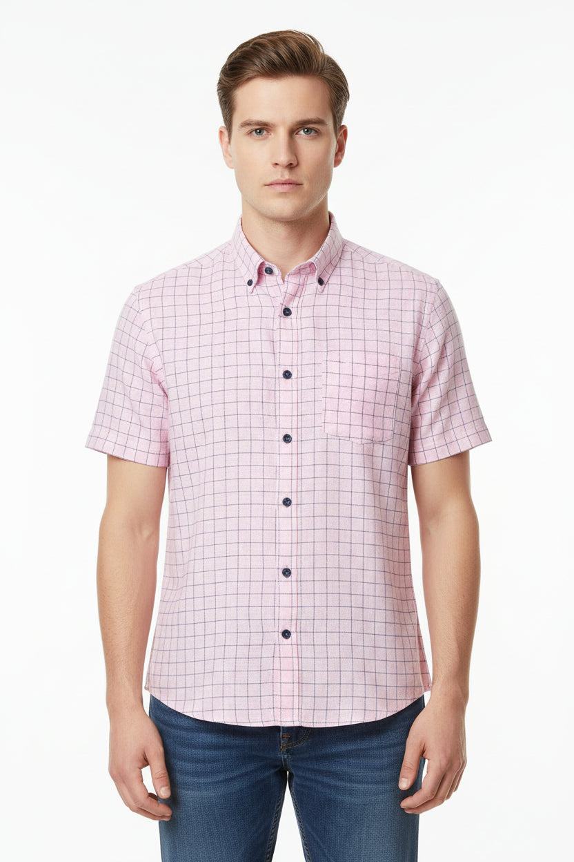 Blue check linen fabric from Arvind Tresca with pink background, showcasing a soft, lightweight textile ideal for shirts.