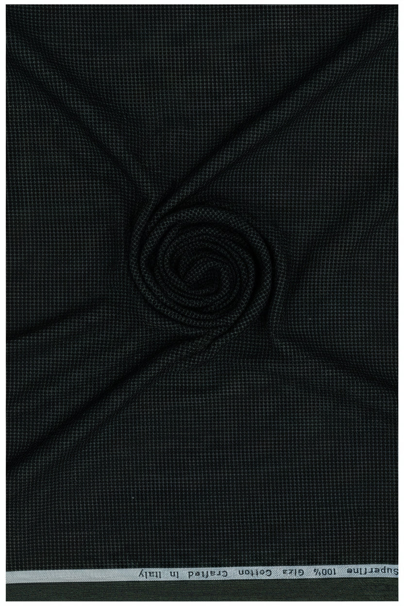 Dark green unstitched Primante cotton shirting fabric by Arvind, showcasing smooth woven texture and luxurious fabric quality.