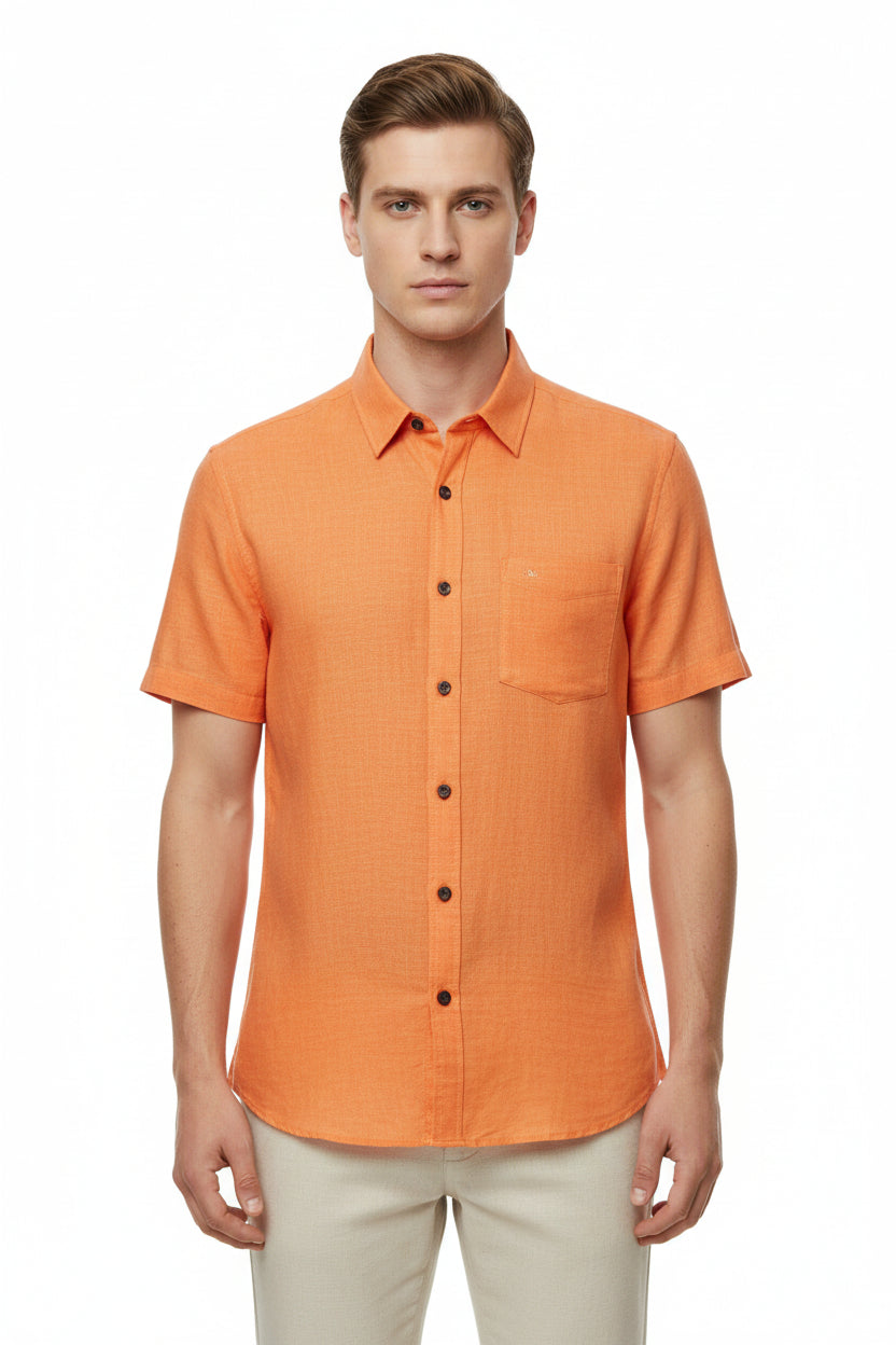 Orange Arvind Tresca cotton unstitched shirting fabric with detailed weave pattern, suitable for making custom shirts.