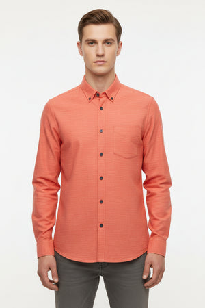 Orange Arvind Tresca cotton unstitched shirting fabric with a smooth texture and subtle pattern, suitable for custom shirts.