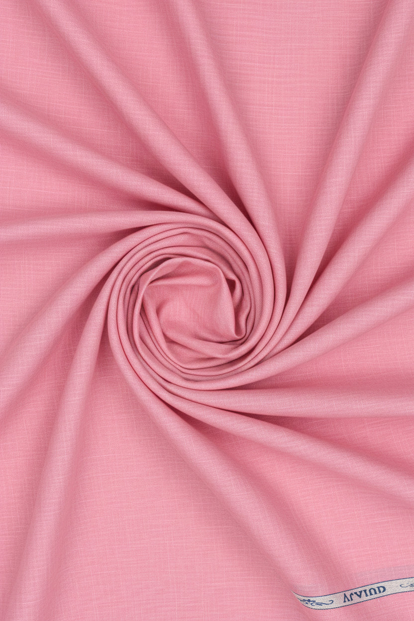 Arvind Tresca cotton unstitched shirting fabric in flamingo pink with a smooth, lightweight texture and vibrant color.