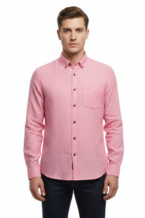 Arvind Tresca cotton unstitched shirting fabric in flamingo pink, showing smooth fabric texture and vibrant color detail.