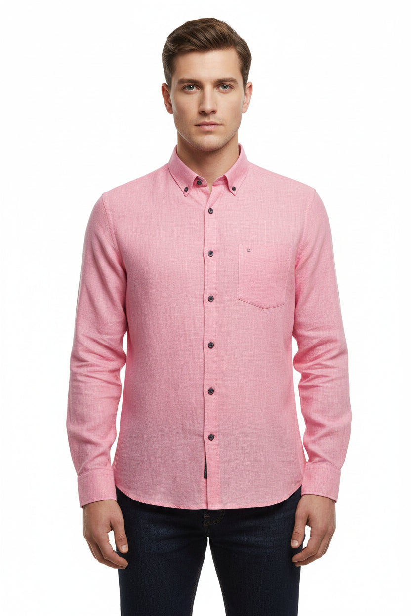 Arvind Tresca cotton unstitched shirting fabric in flamingo pink, showing smooth fabric texture and vibrant color detail.