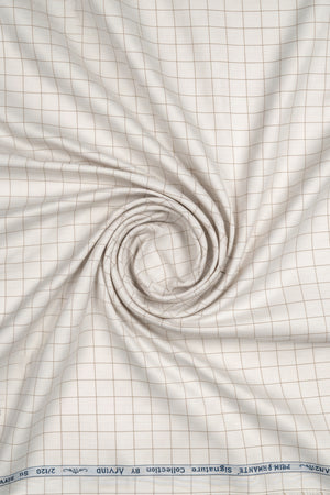 Brown Arvind Primante cotton checks shirting fabric with a classic check pattern, ideal for stylish shirts and casual wear.