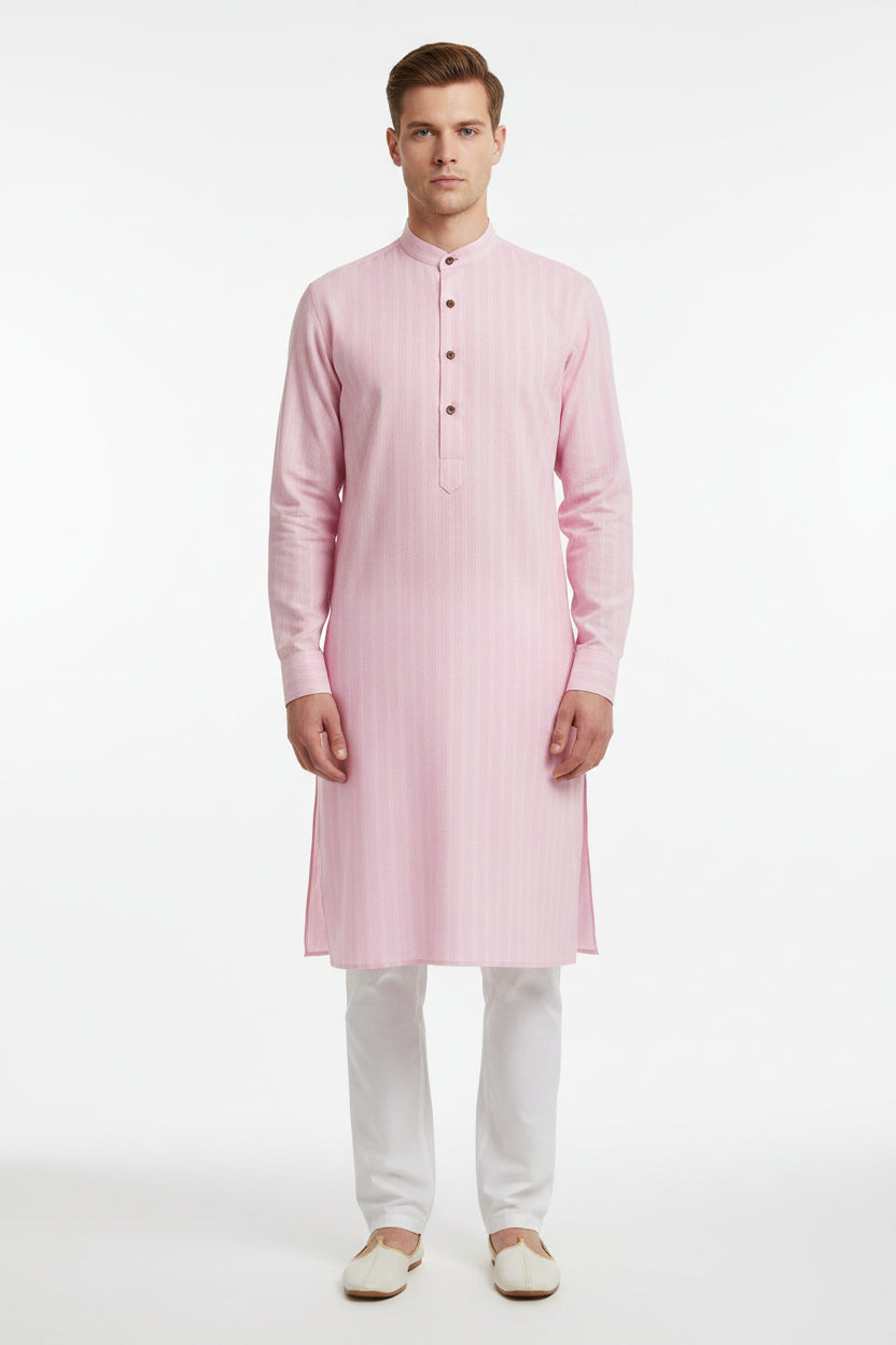 Pink Arvind cotton shirting fabric, close-up of smooth woven textile with subtle sheen, ideal for shirts and dressmaking