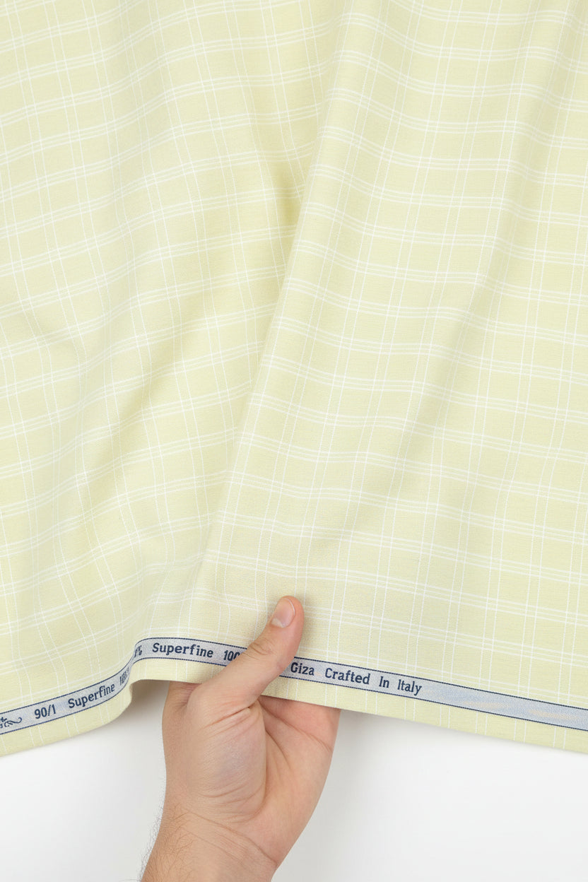 Lemon yellow Arvind Giza cotton unstitched shirt fabric with intricate patterns, ideal for creating elegant traditional attire.