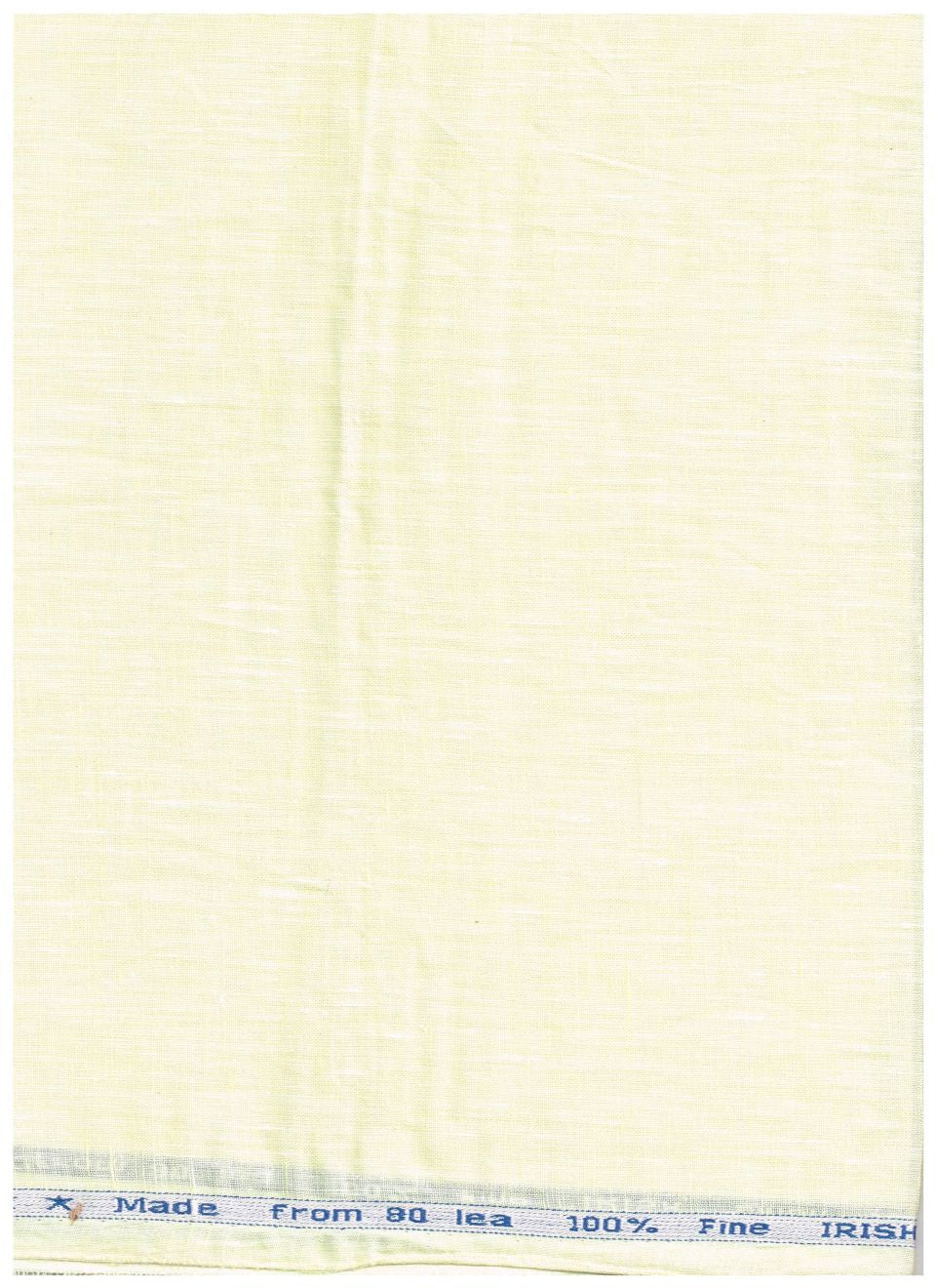 A close-up of a light cream or off-white woven fabric with a visible texture and a narrow printed header strip at the top edge.
