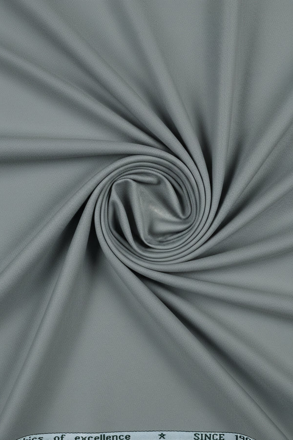 Grey Mafatlal poly viscose trouser and suiting fabric shown in the image, featuring smooth, high-quality textile with subtle texture.