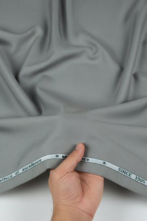 Grey Mafatlal unstitched poly viscose trouser and suiting fabric, showcasing soft, woven textile for tailoring or fashion design.