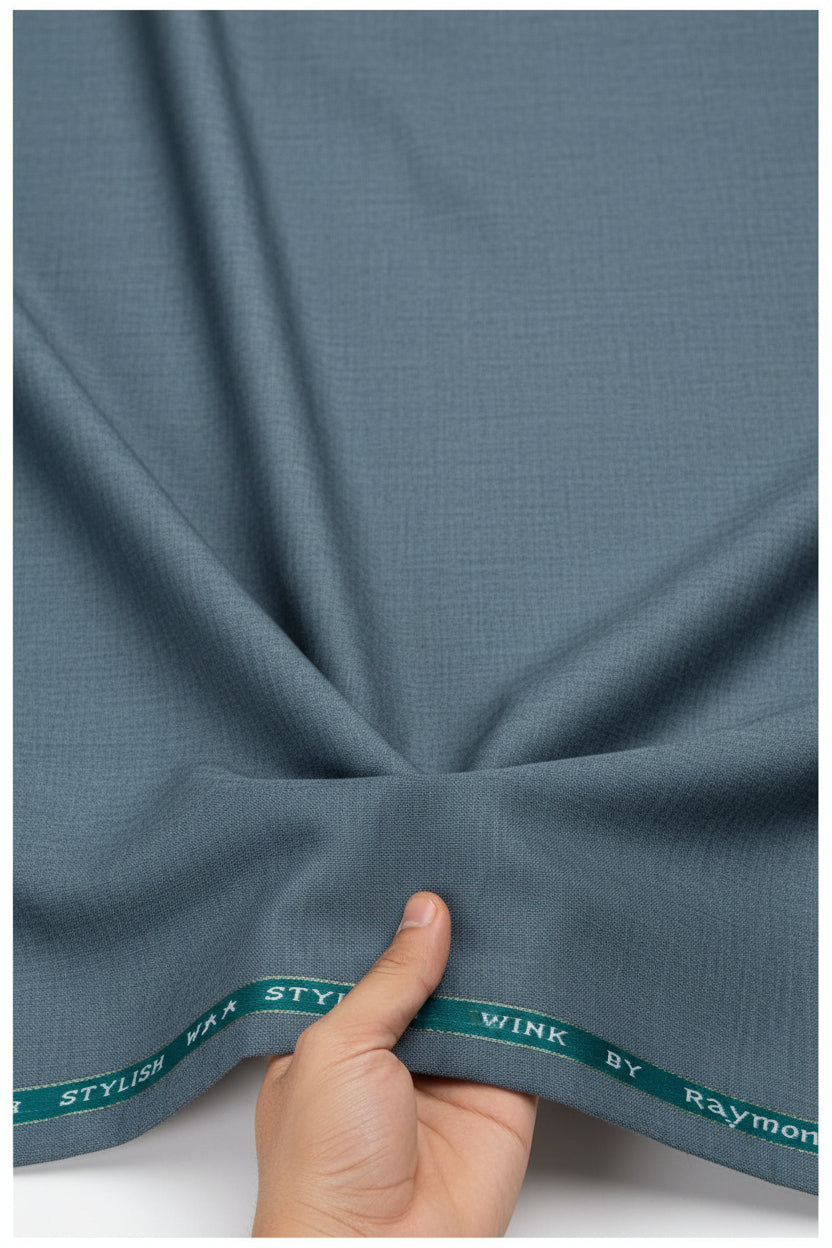 Raymond unstitched poly viscose trouser fabric in gravel blue grey, showcasing textured textile material for custom tailoring.