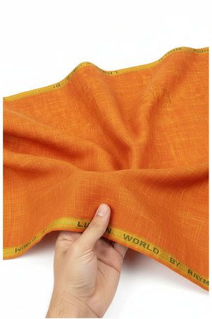 Orange Raymond linen plain unstitched shirting fabric by ARVIND, showcasing smooth, lightweight textile with a clean, solid finish.