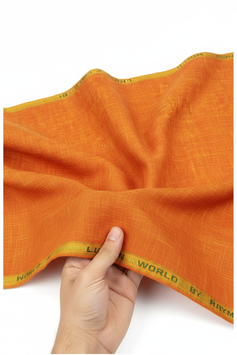 Orange Raymond linen plain unstitched shirting fabric by ARVIND, showcasing smooth, lightweight textile with a clean, solid finish.