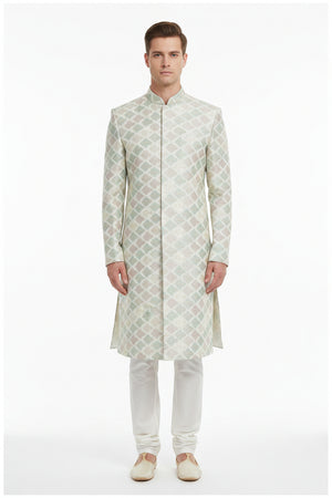 Beige Raymond unstitched poly-viscose jacquard fabric for sherwani and Modi jacket, detailed textured design and elegant pattern.