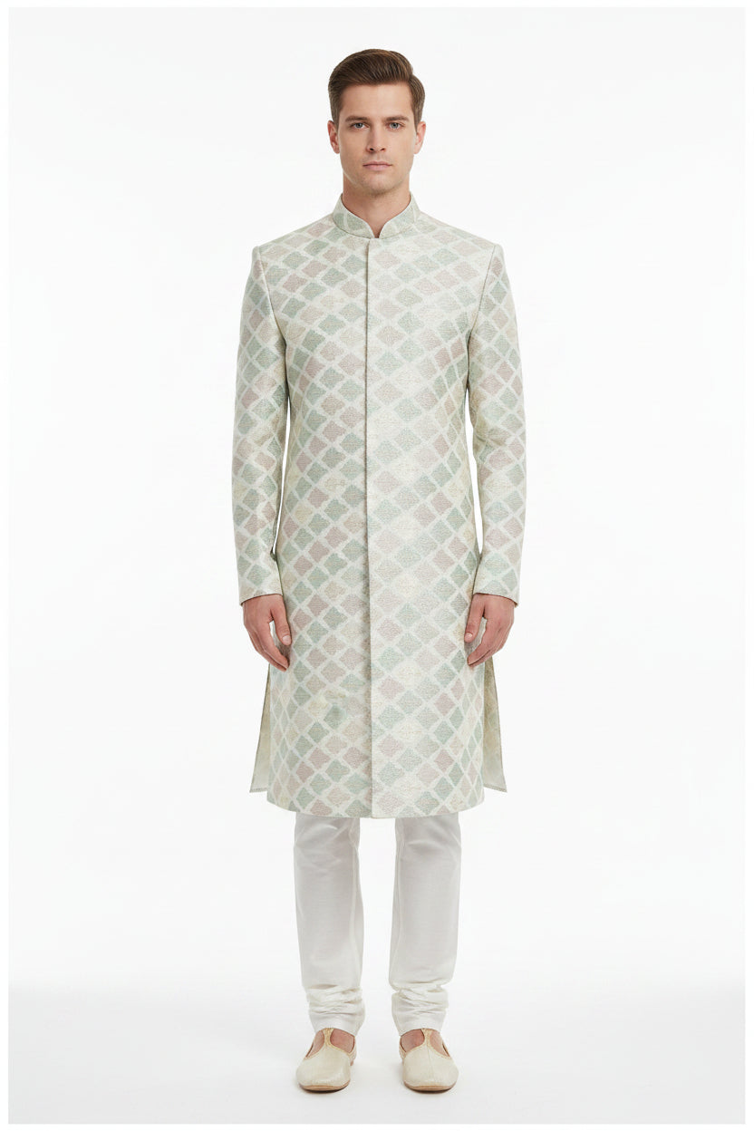 Beige Raymond unstitched poly-viscose jacquard fabric for sherwani and Modi jacket, detailed textured design and elegant pattern.