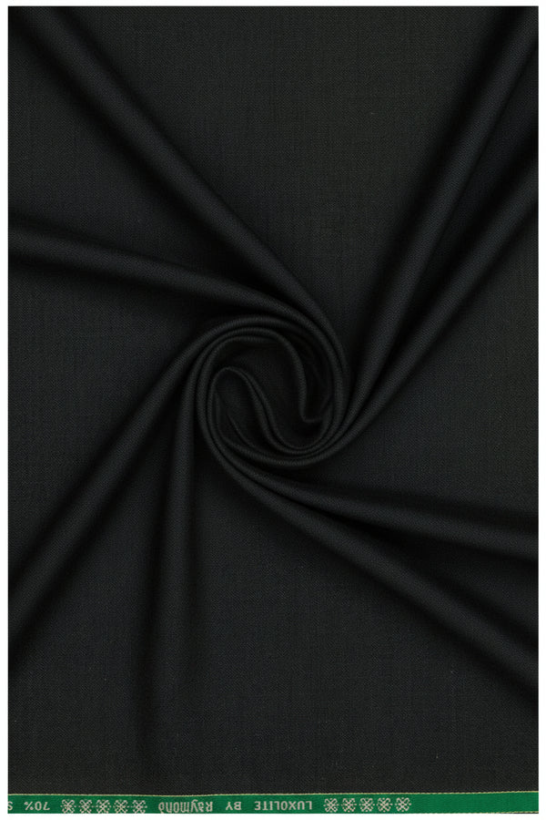 Raymond wool blend suiting fabric in green spinach color, showing a close-up of the textured woven material.