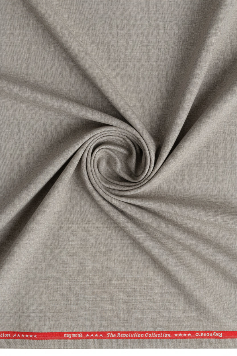 Beige Raymond unstitched poly wool fabric for trousers and suits, shown in a close-up of the textured textile.