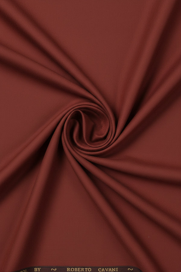 Roberto Cavali 140's poly wool trouser and suiting fabric in rust red, close-up of textured fabric swatch.