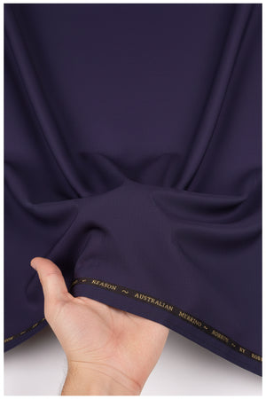 Roberto Cavali 140's Italian polywool suiting fabric in matte purple, shown as a close-up of the textured textile.