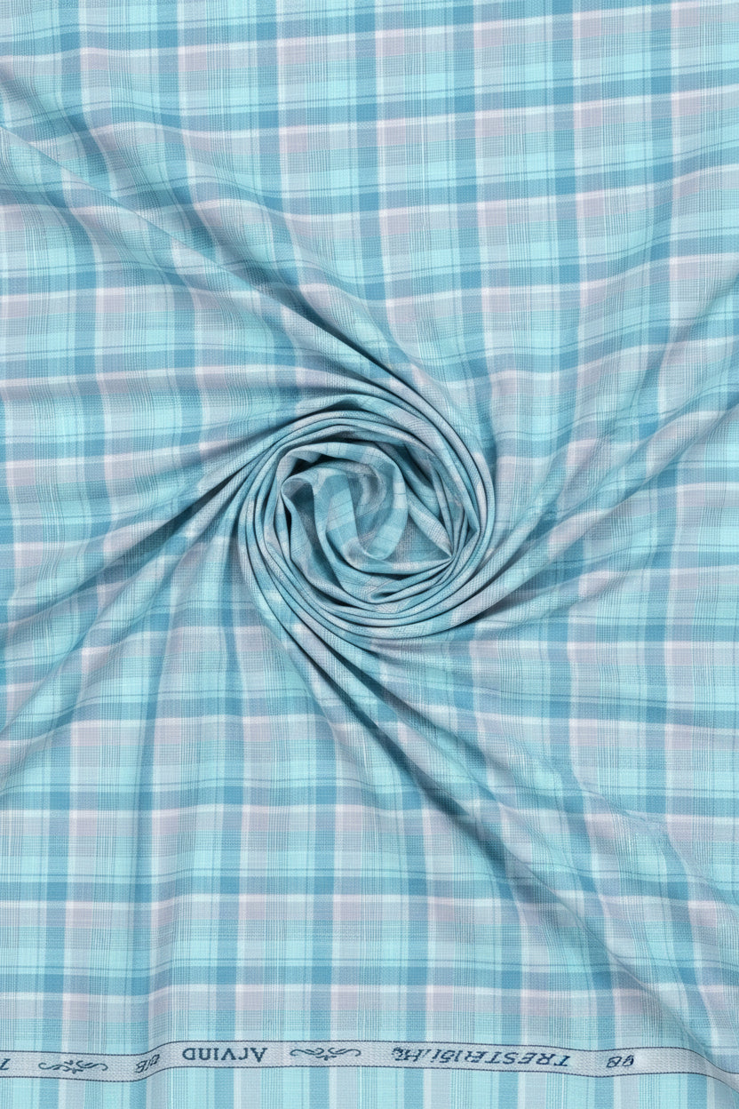 Blue and white checkered fabric with 'Tresca by Arvind' branding.