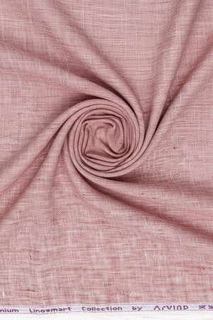 Light coral Arvind Tresca linen plain shirting fabric showcasing smooth, high-quality linen texture suitable for clothing.