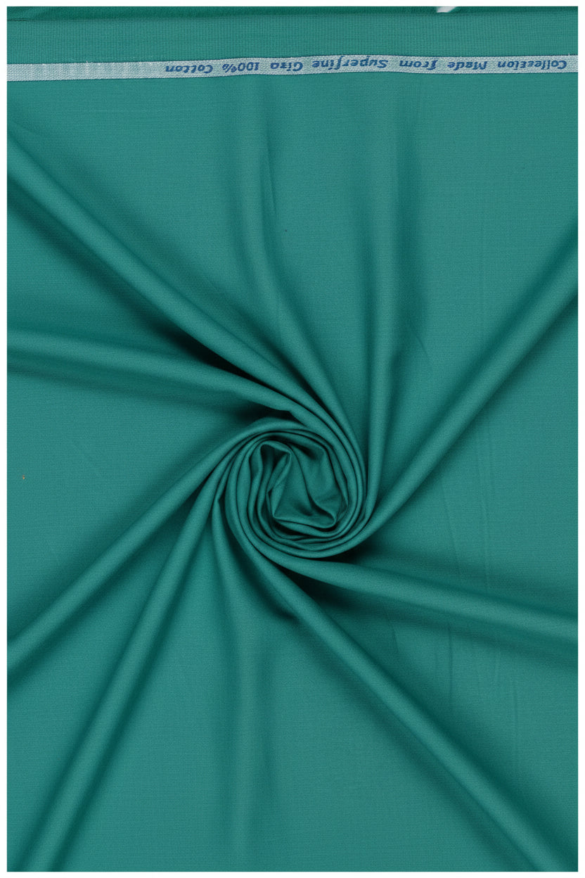 Teal green Arvind cotton shirt fabric with intricate weave pattern, ideal for making stylish shirts or garments.