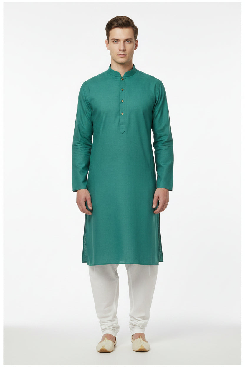 Teal green cotton shirt fabric by Arvind, textured textile with subtle patterns suitable for shirts or apparel.